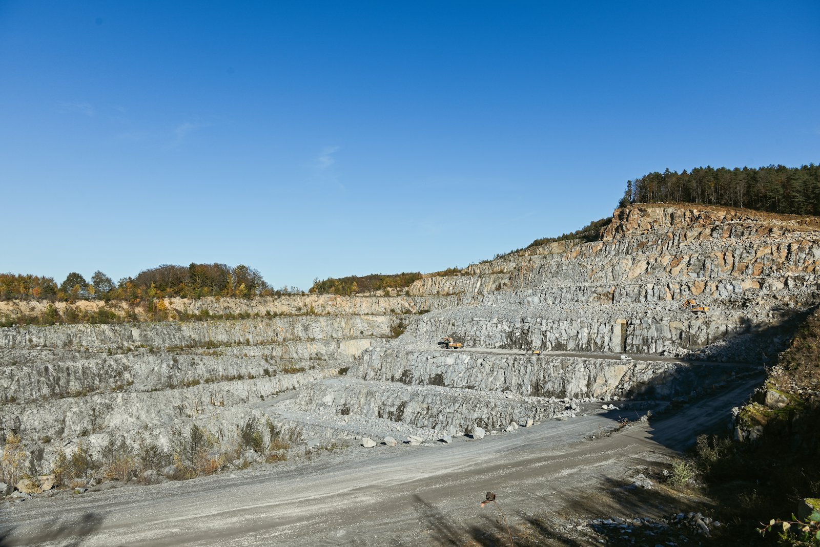 Terraced granite quarry face